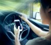 Driver using phone (Image: Shutterstock, The Conversation)